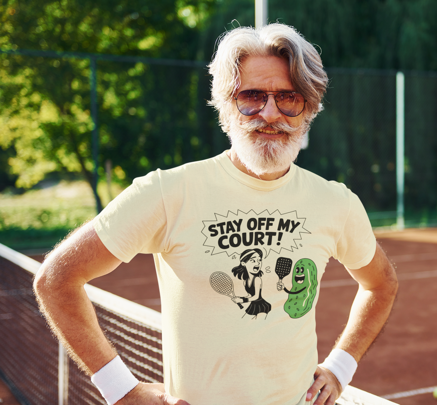 a male tennis player wearing a Stay off my court funny t shirt featuring female tennis player yelling at a pickle ith a pickle raquet