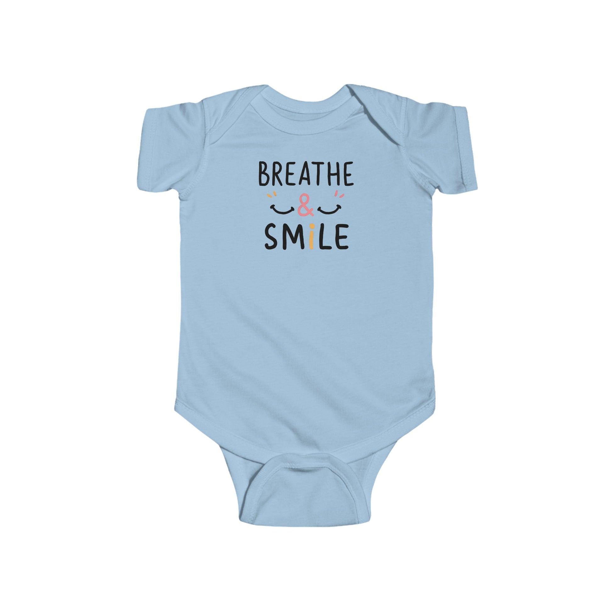 a onesie with the words breathe & Smile
