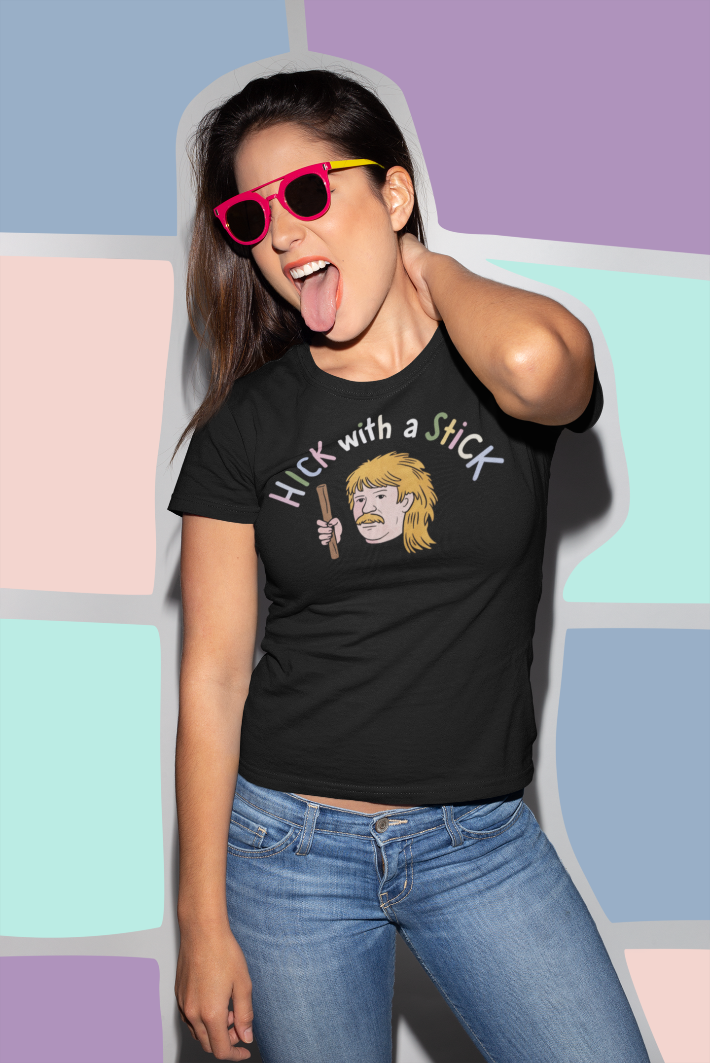 a young funky womanb wearing a shirt with  illustration of hillbilly with mullet holding a stick with the funny caption Hick with a Stick