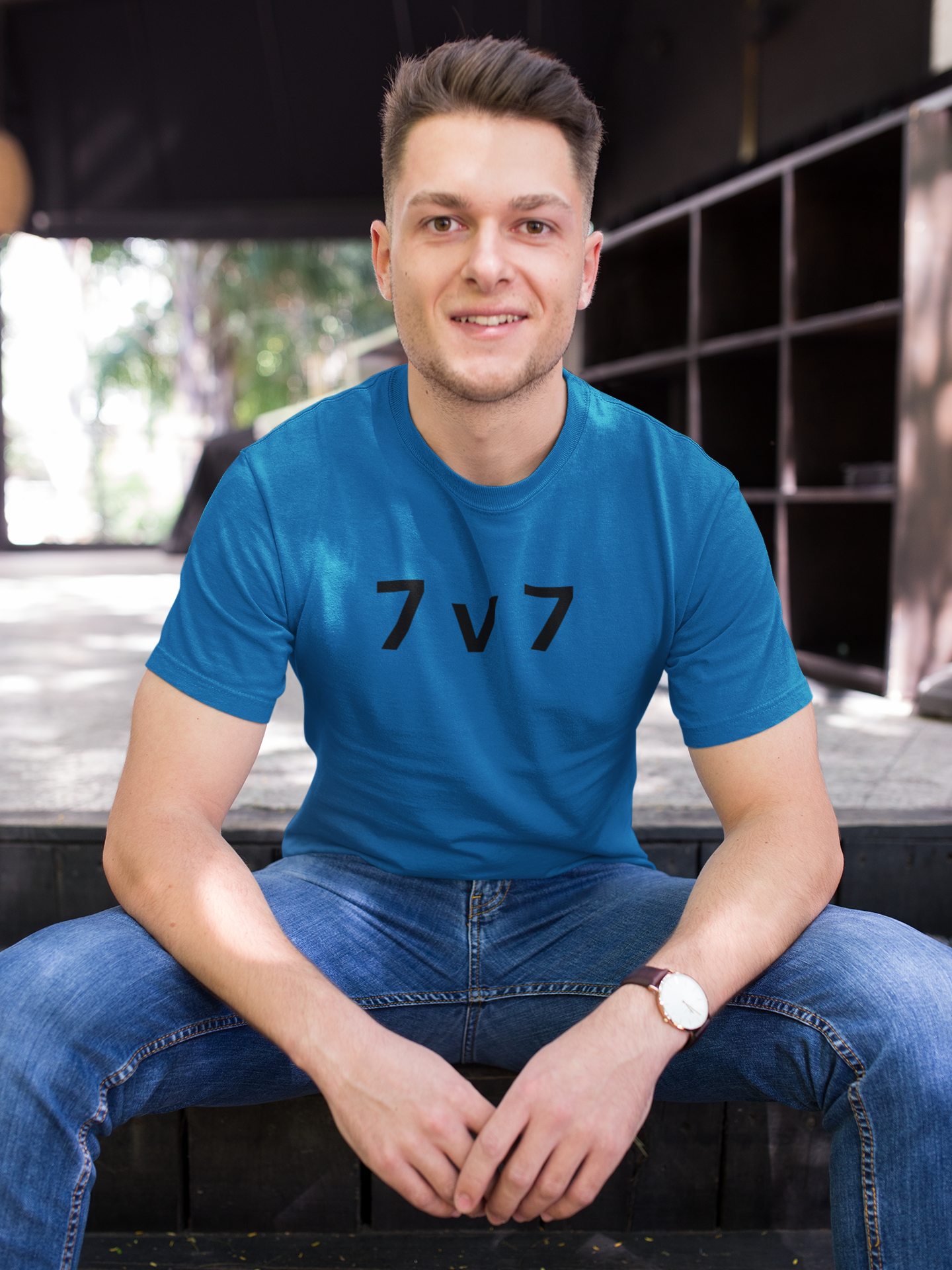 a young hip man 7 v 7 ultimate frisbee shirt with caption 7 v 7