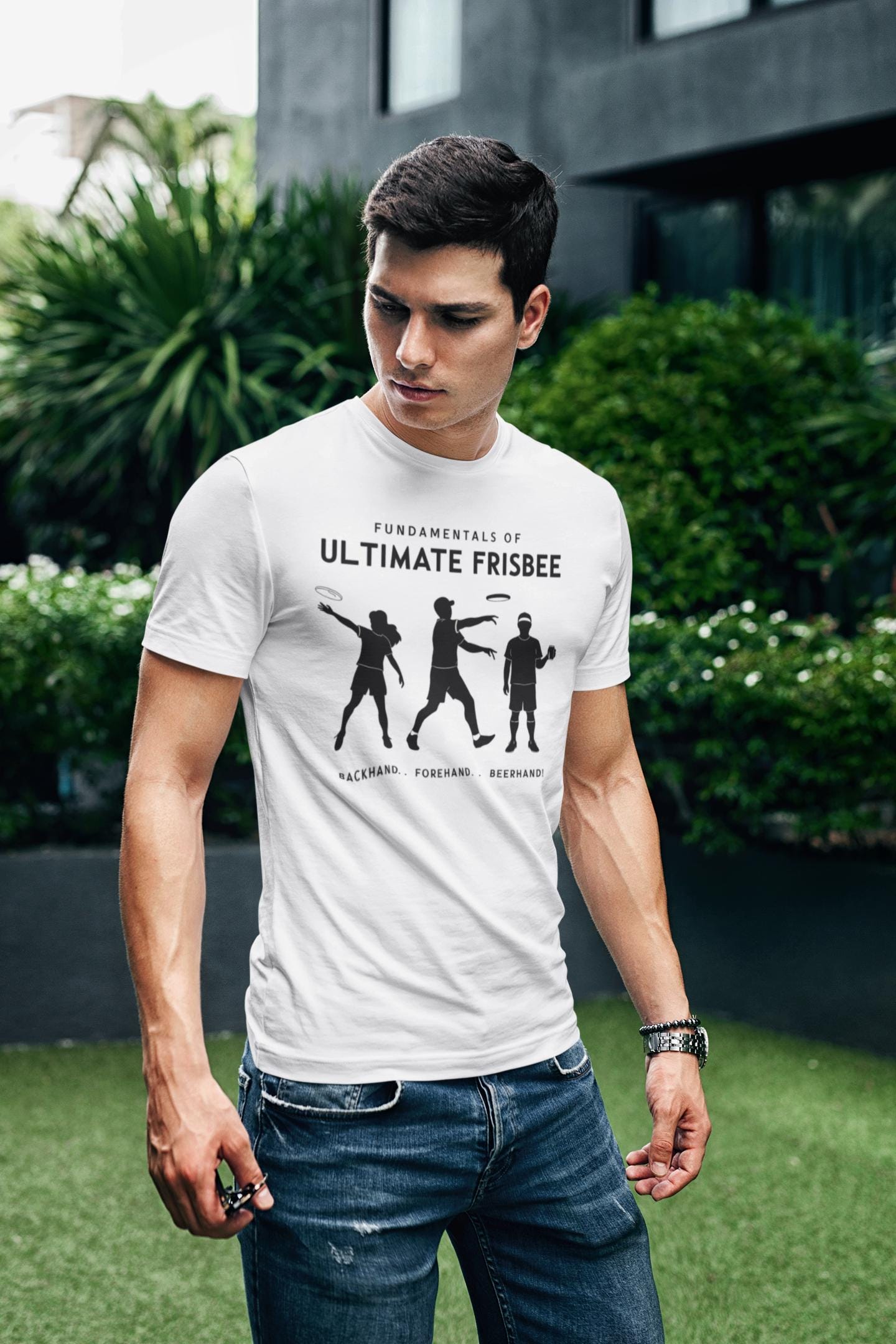 a man sporting a t shirt with a three stages of ultimate frisbee of people tossing of fundamentals of ultimate frisbee-backhand forehand and beerhand
