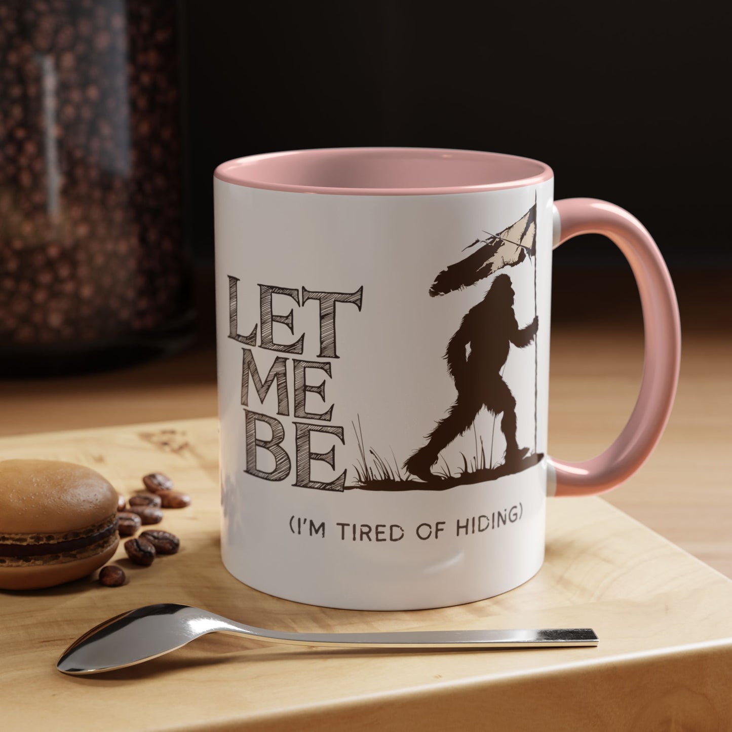 a coffee mug on table bigfoot is roaming the woods with the caption Let Me Be I'm Tired Of Hiding