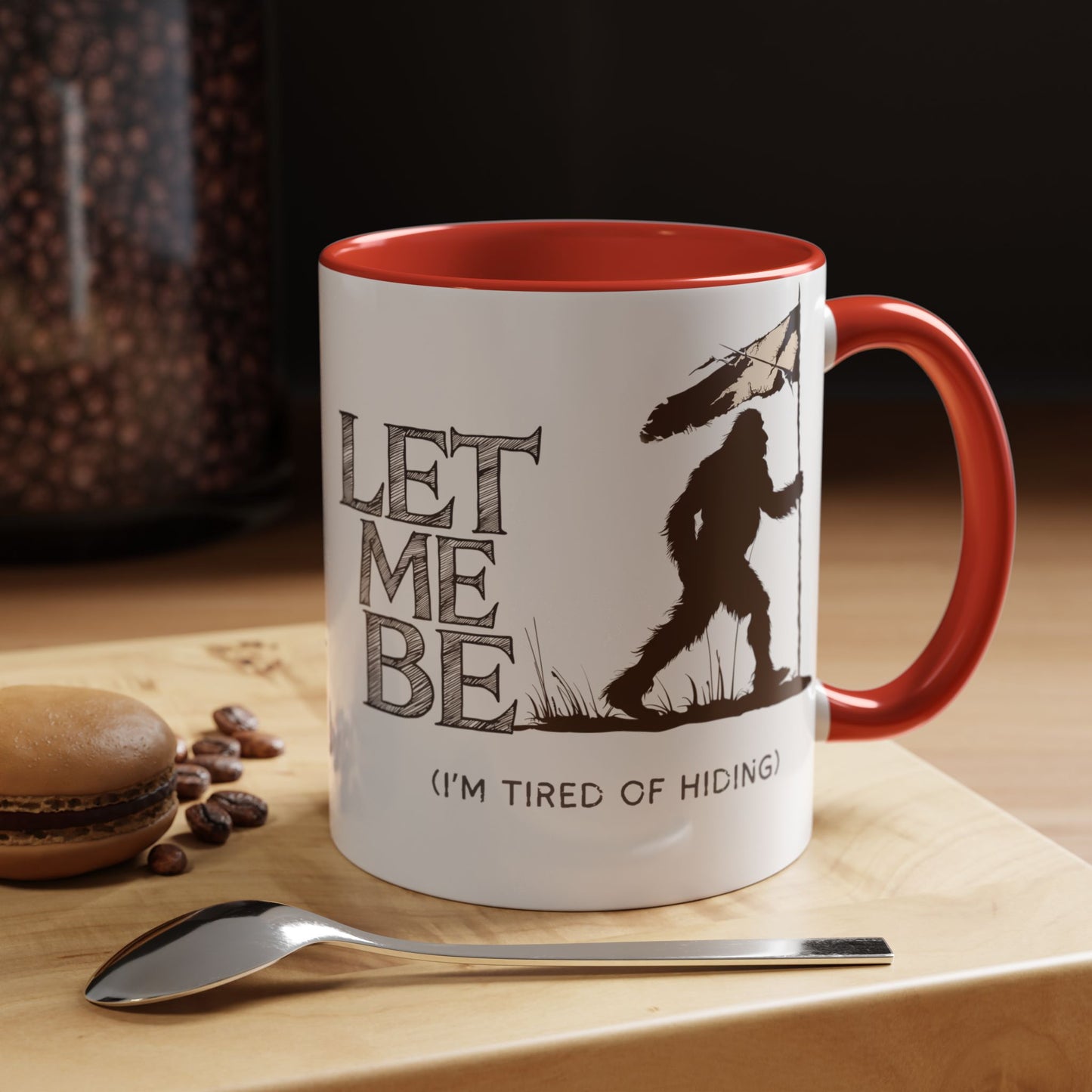 a coffee mug on table bigfoot is roaming the woods with the caption Let Me Be I'm Tired Of Hiding