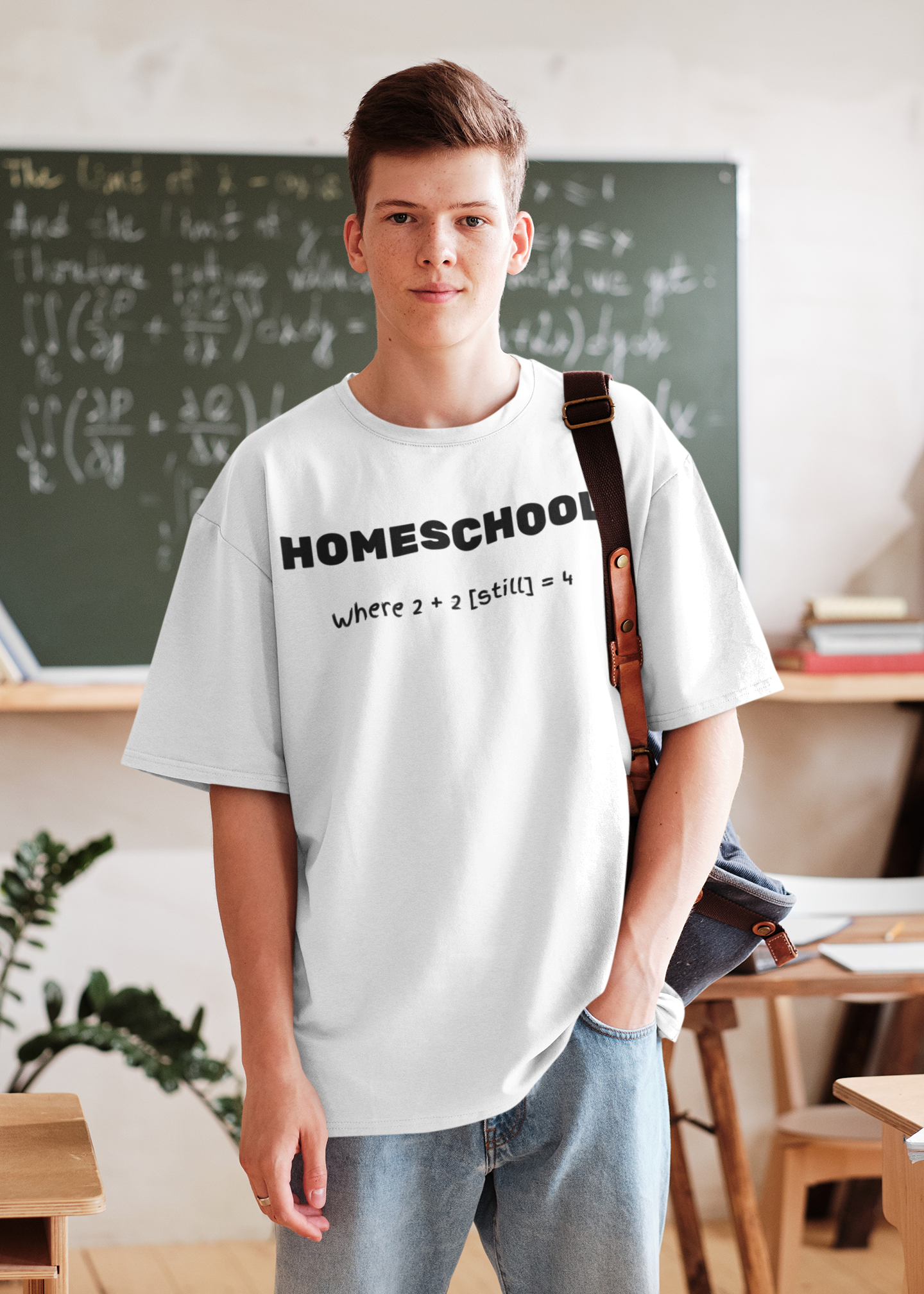 a studen wearting a  shirt with logo Homeschool Where 2 + 2 {still} = 4
