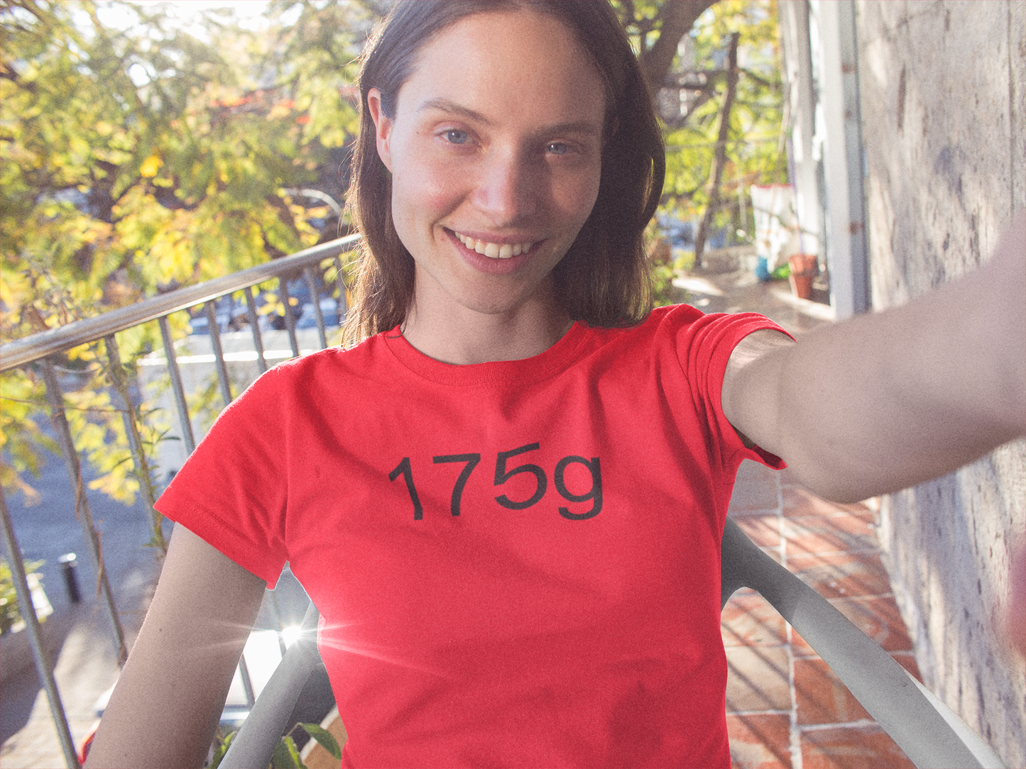 a girl wearing 175g ultimate frisbee shirt with caption 175g