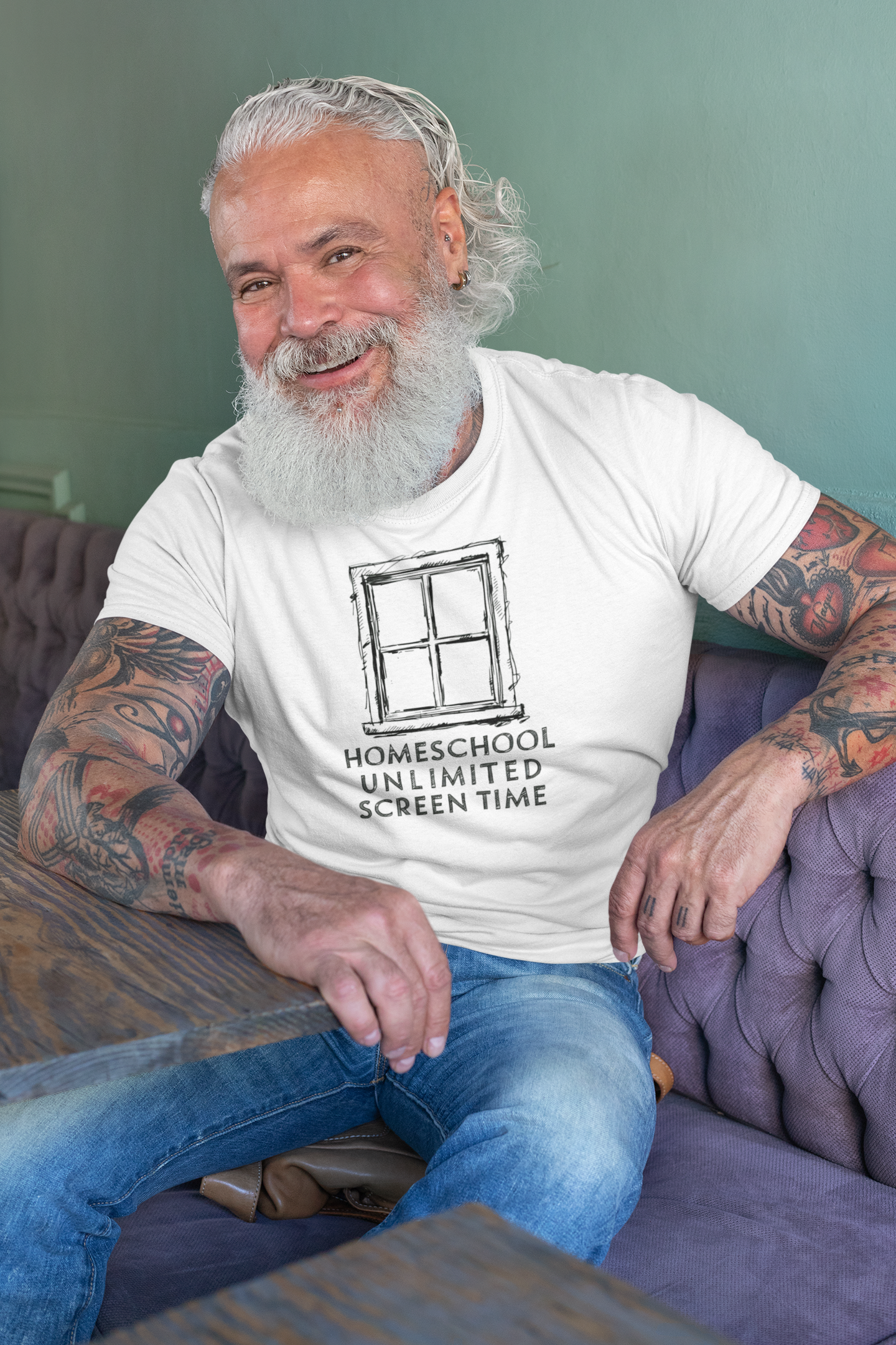 a senior man wearing a shirt with a frame of window with the words Homeschool Unlimited Screen Time