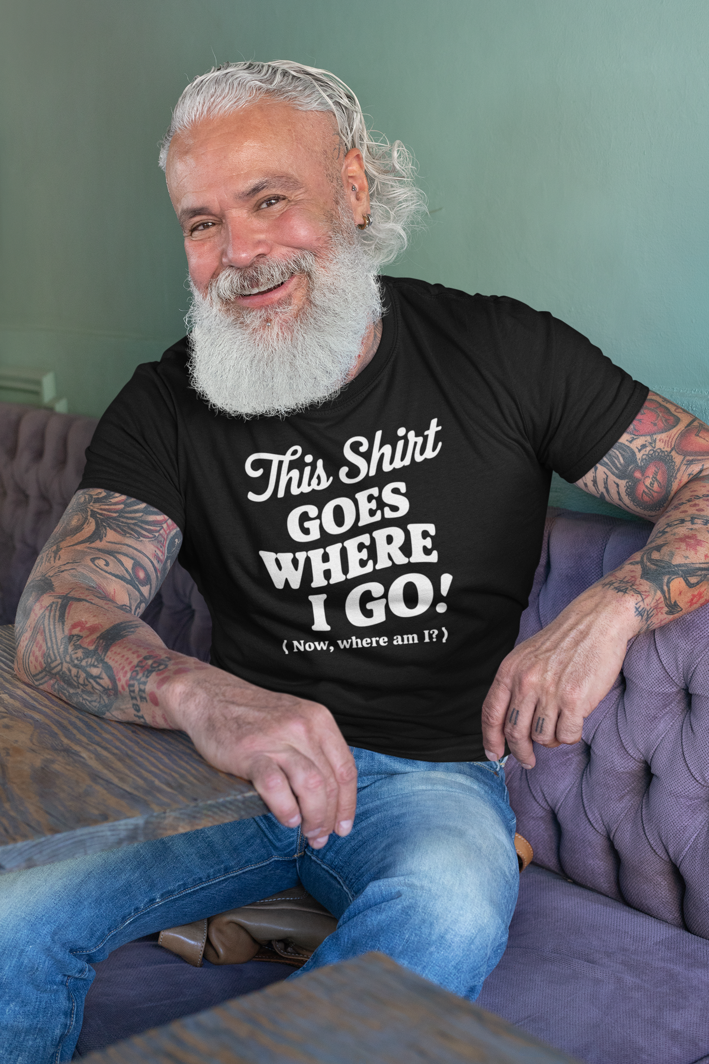 a senior man wearing a  funny t-shirt with slogan This Shirt Goes Where I Go - Now Where Am I?