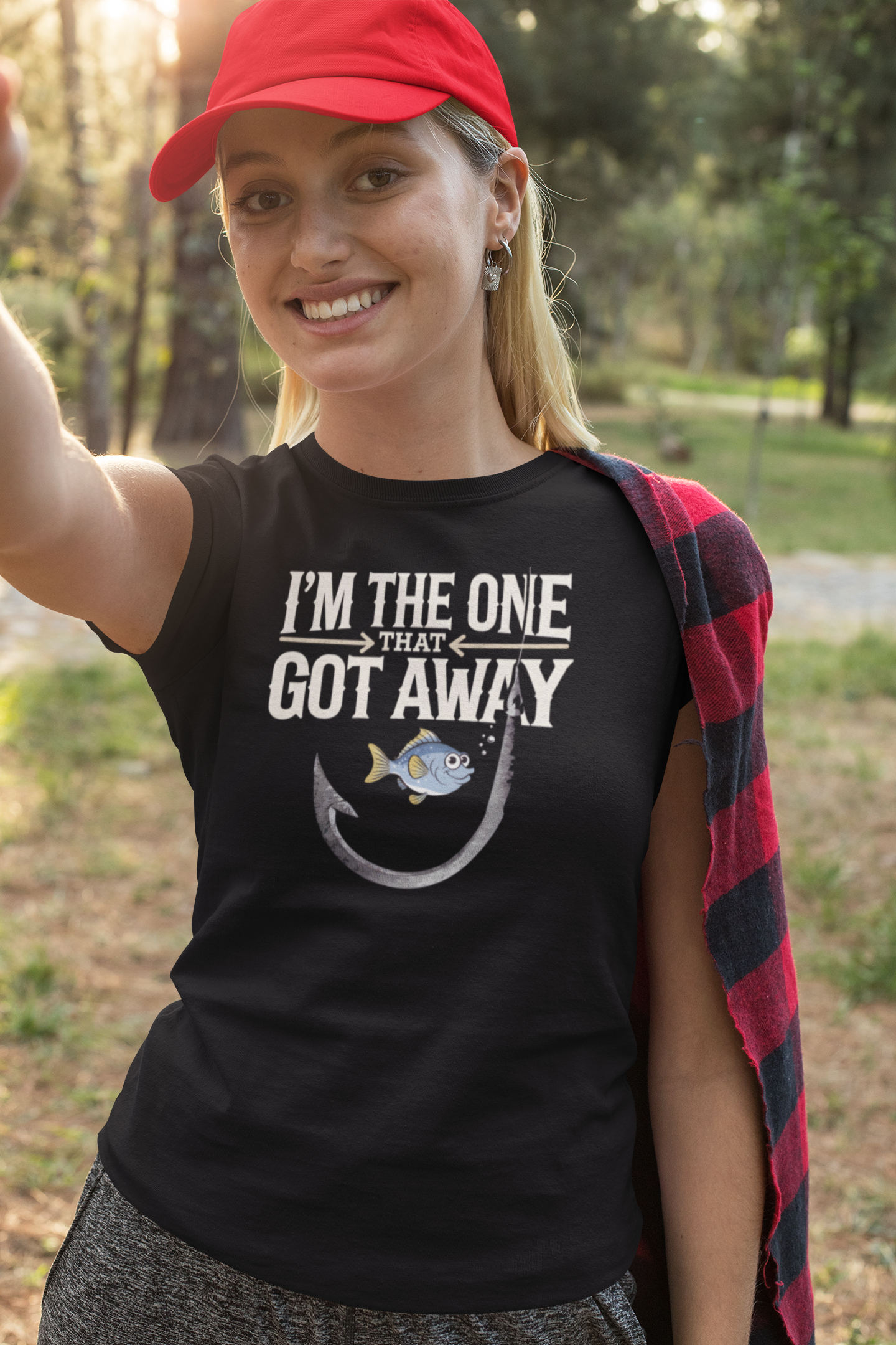 a great fishing gift for a I'm The One That Got Away Angler Shirt with fish hook