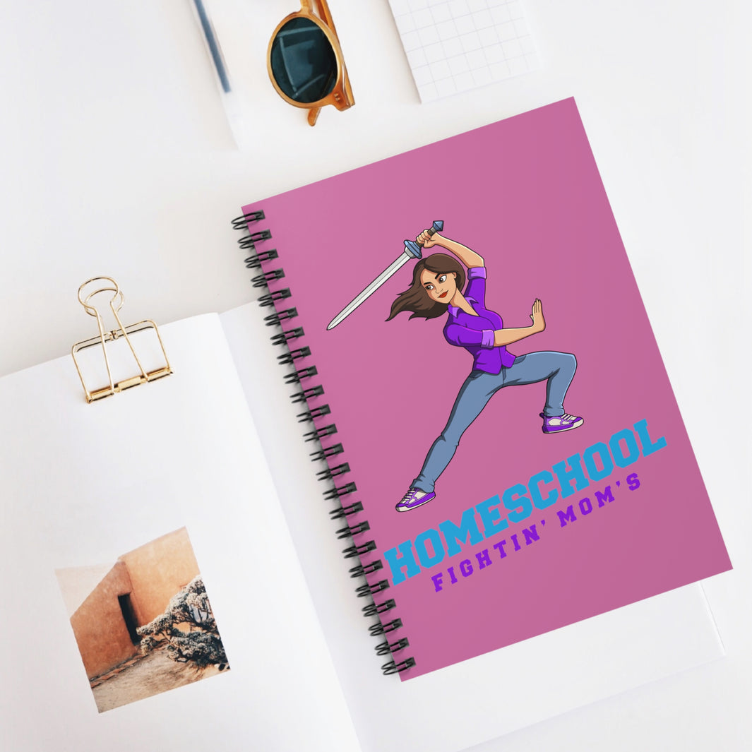 A pink notebook with cartoon warrior with the slogan homeschool fightiin mom's 