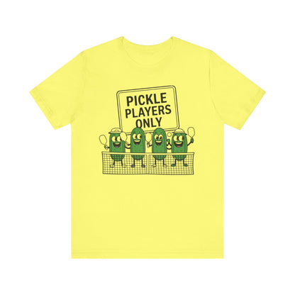 Pickle Players Only Shirt featuring a row of smiling pickles holding pickleball raquets behind a net