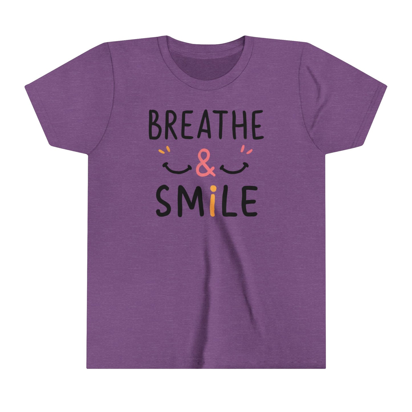  a t-shirt with the caption Breathe & Smile. two smile faces adore the caption