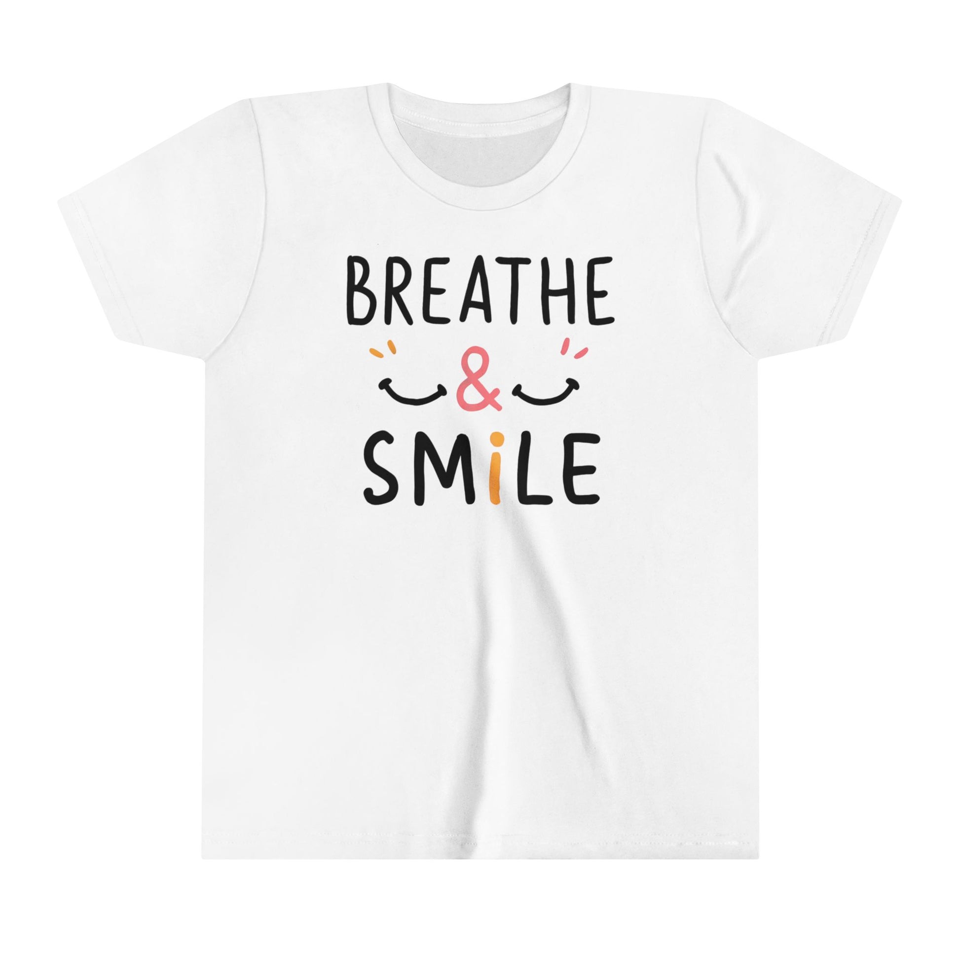  a t-shirt with the caption Breathe & Smile. two smile faces adore the caption