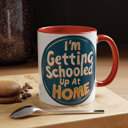 a mug on a cutting board. The mug is captioned with the words I'm Getting Schooled Up At Home