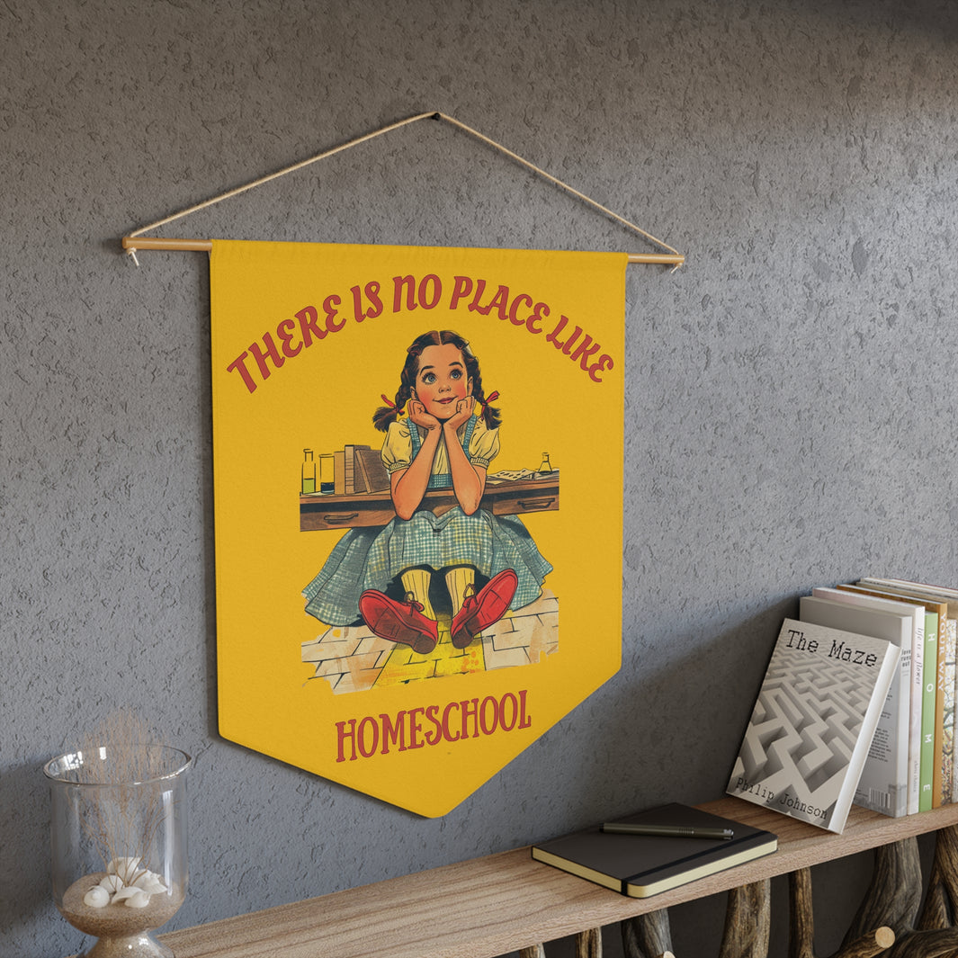 a yellow pennant on a living room wall. the pennant has the caption There is no place like homeschool