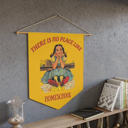 a yellow pennant on a living room wall. the pennant has the caption There is no place like homeschool