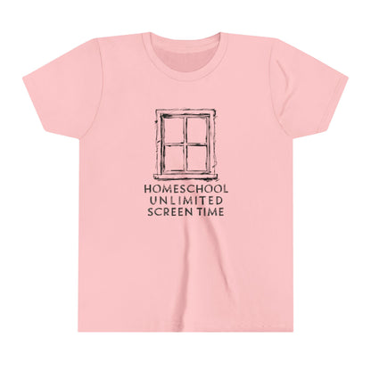 a blonde haired boy writing on table wearing a t-shirt with homeschool unlimited screen time