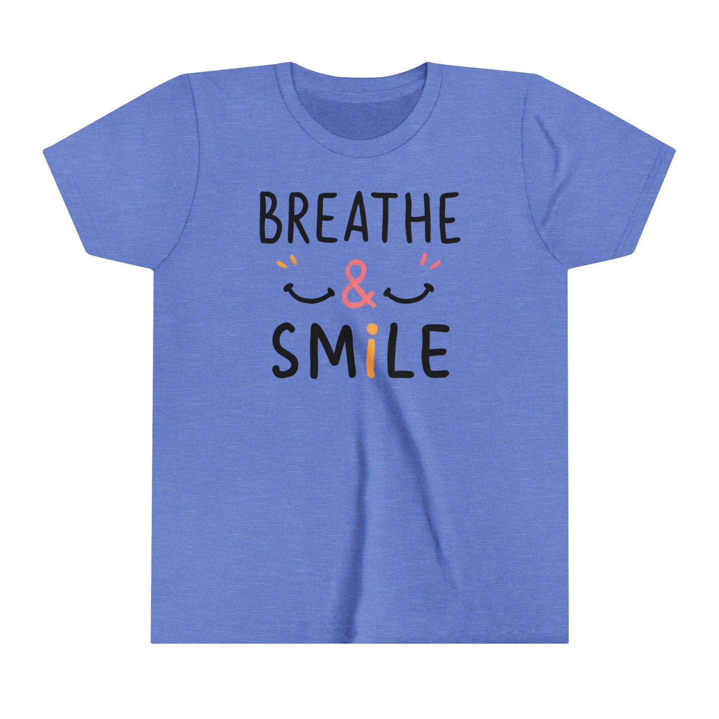 a t-shirt with the caption Breathe & Smile. two smile faces adore the caption