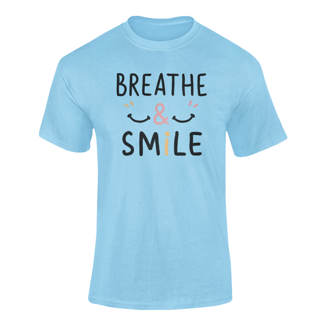 a t shirt with a happy face and the slogan Breathe & Smile