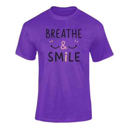 a purple t shirt with a happy face and the slogan Breathe & Smile