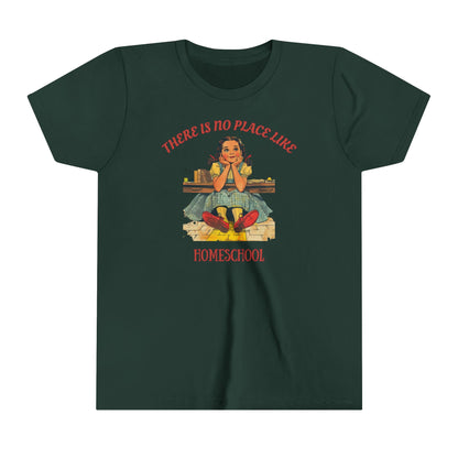 a kids t shirt a girl smiling above golden bricks with the slogan there is no place like homeschool