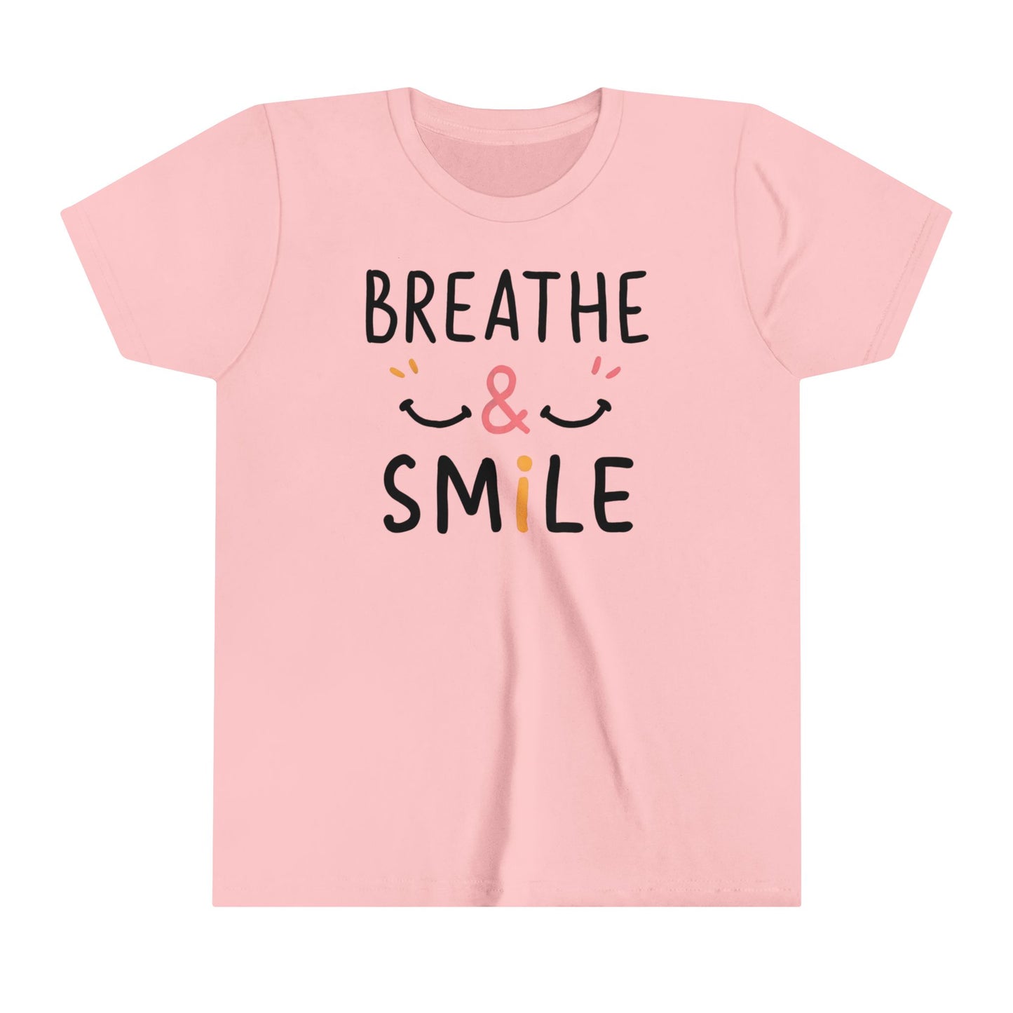  a t-shirt with the caption Breathe & Smile. two smile faces adore the caption