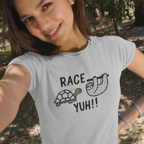 a video with a woman wearing a t shirt with a turtle challenging a sloth to a race with the caption Race Yuh