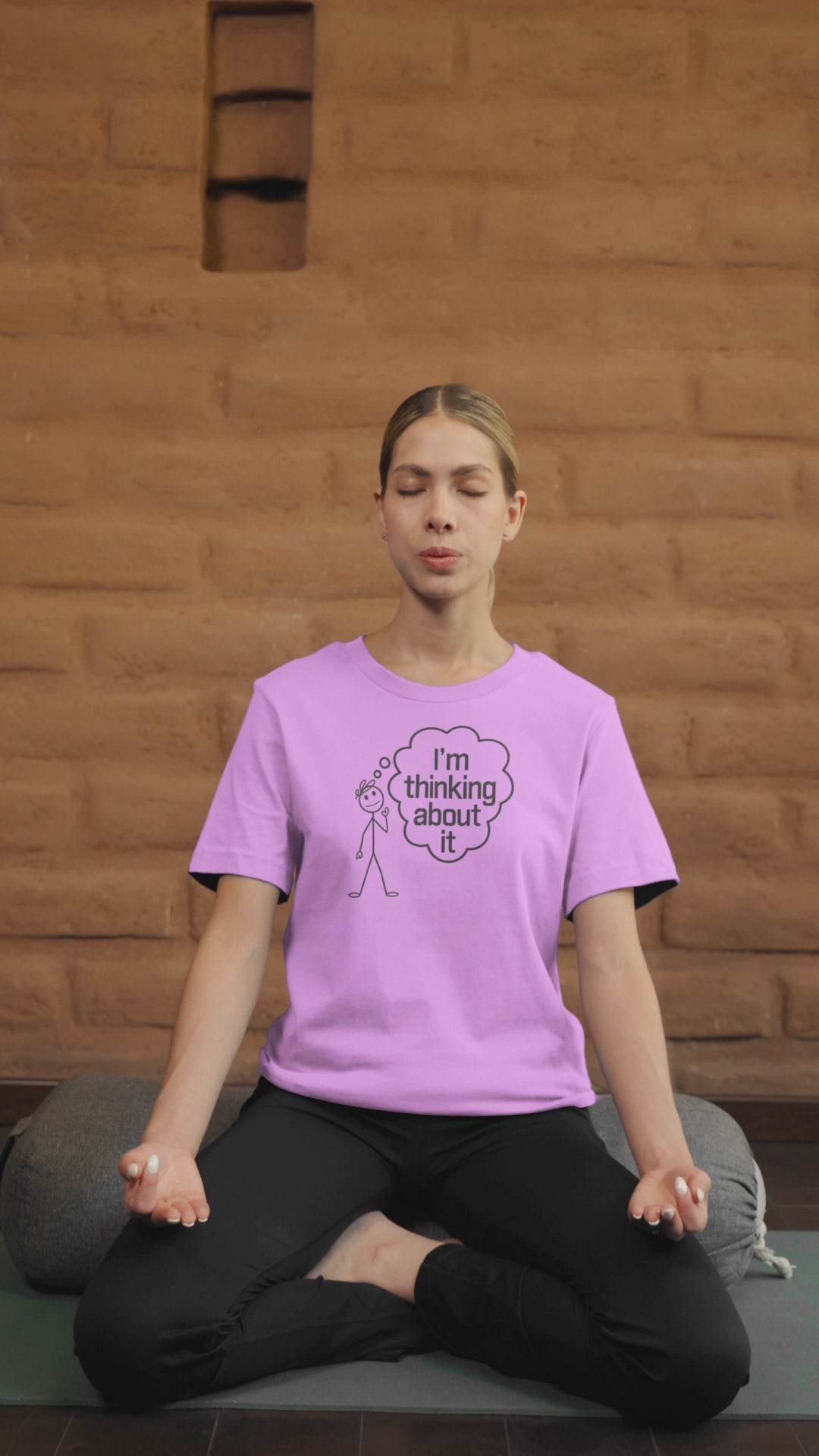 a video of woman practicing yoga wearing a  I'm Thinking About it T-Shirt With Stickman In Deep Yoga thought