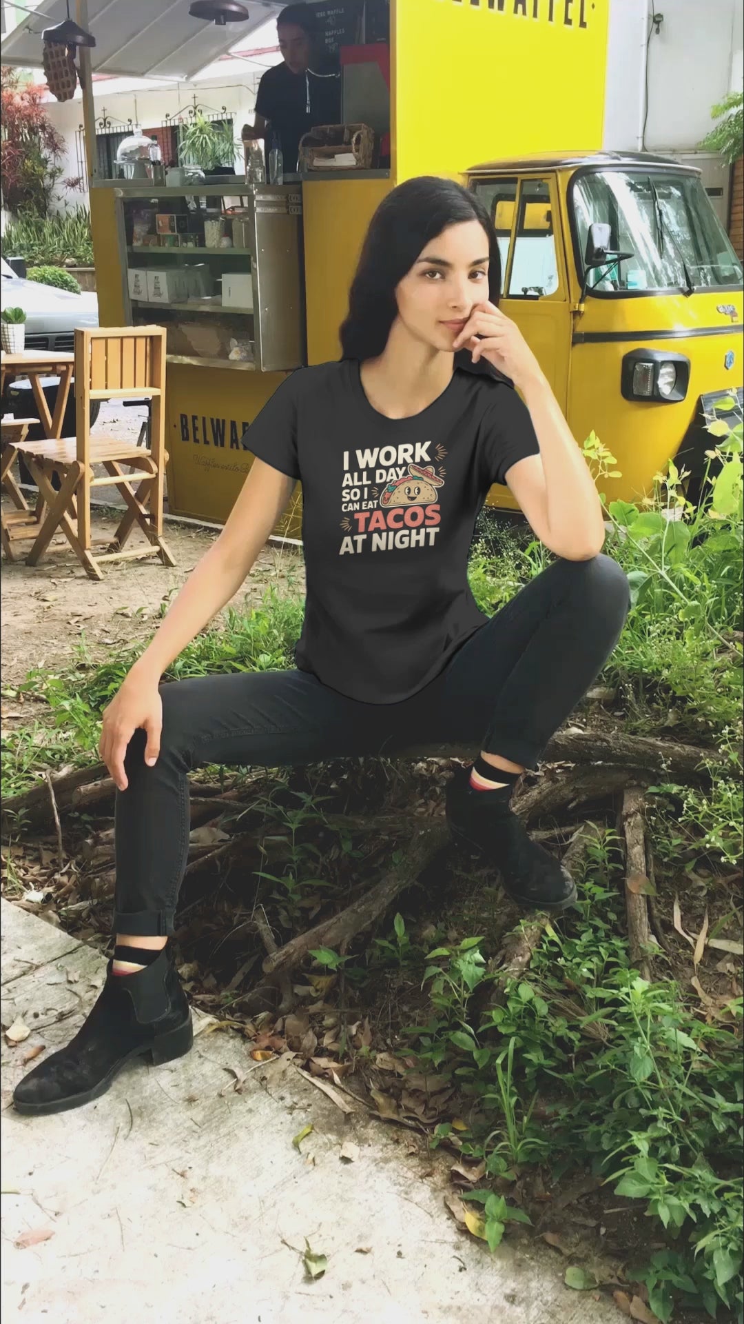 a video of woman sportaing a taco night shirt with the words I Work All Day So I Can Eat Tacos At Night Taco Tuesday T-Shirt
