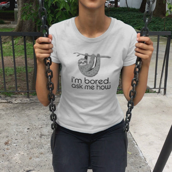 A woman swinging happily on a swing I'm Bored Ask Me How Sloth Shirt
