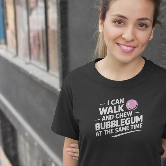 a sporty girl wears vido smiling with teacher a t-shirt that reads I Can Walk And Chew Bubblegum At The Same Time. G