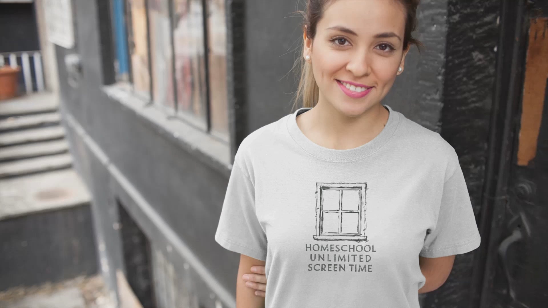 a video with a young woman wearing a shirt with a frame of window with the words Homeschool Unlimited Screen Time