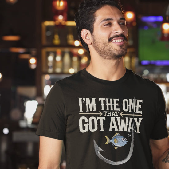 a video of cool man wearing a I'm The One That Got Away Angler Shirt with fish hook