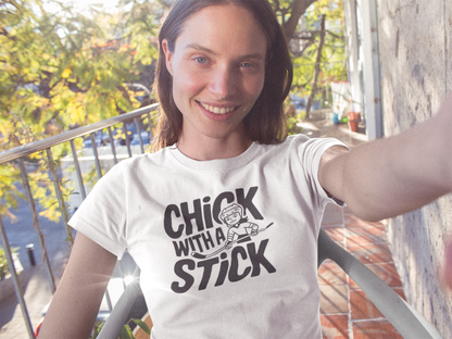 a cool girl wearing a  t shirt of  girl holding a hockey stick with the caption Chick With A Stick