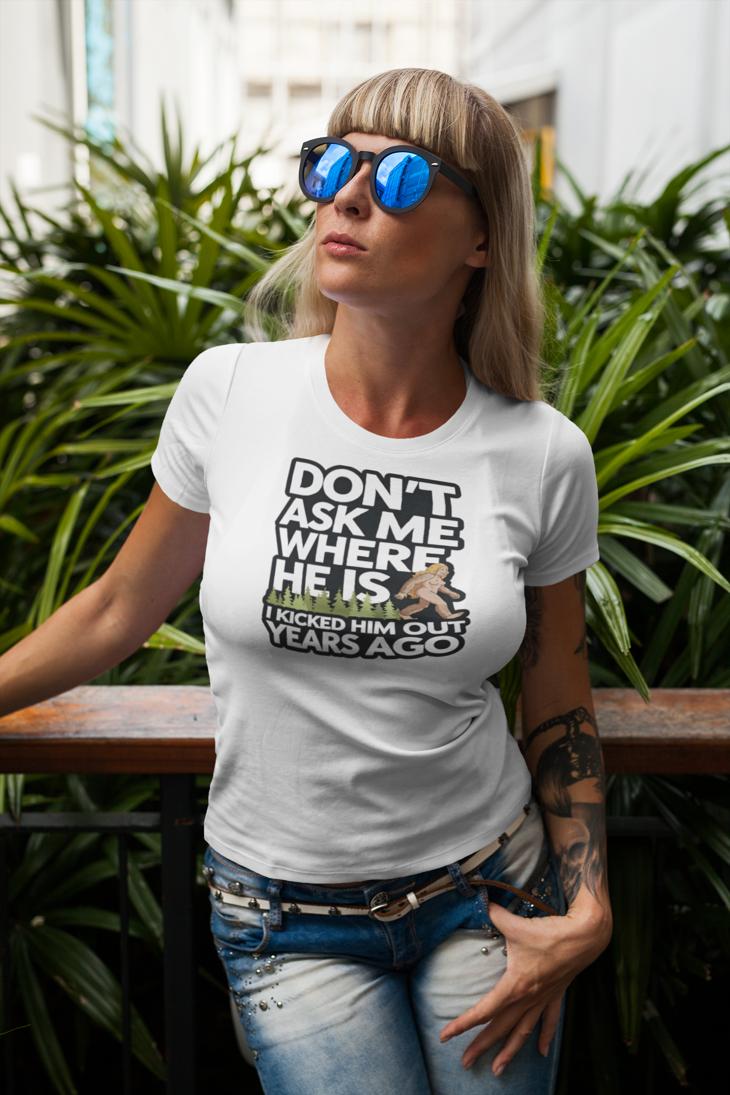 a cool mature woman sporting A T-shirt with a female bigfoot with the caption Don't Ask Me Where He Is I Kicked Him Out Years Ago. Funny Bigfoot shirt