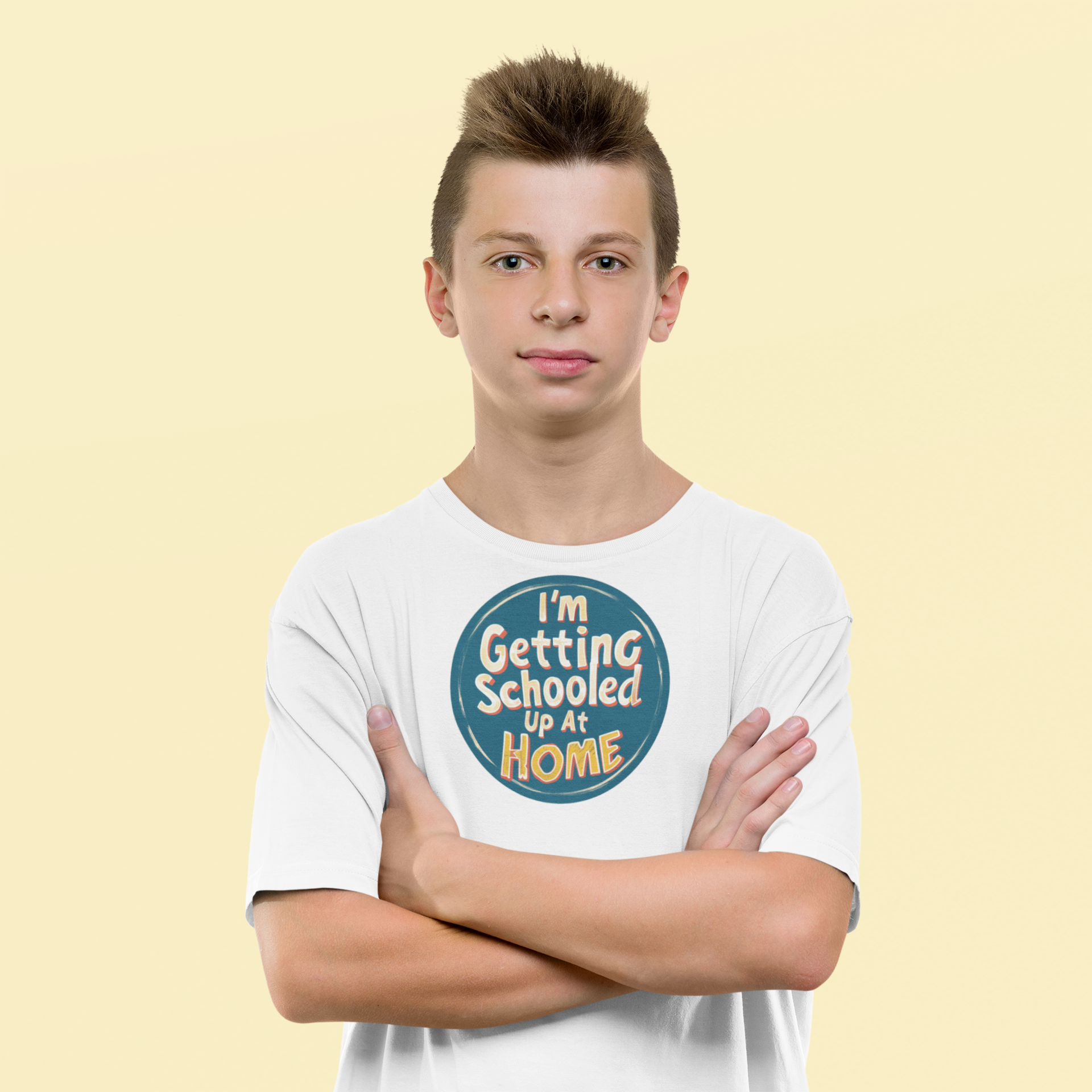 a young man wearing a retro design shirt with the logo I'm Getting Schooled Up At Home 